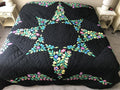 Black Amish Quilt with a Stunning Flower Star Pattern