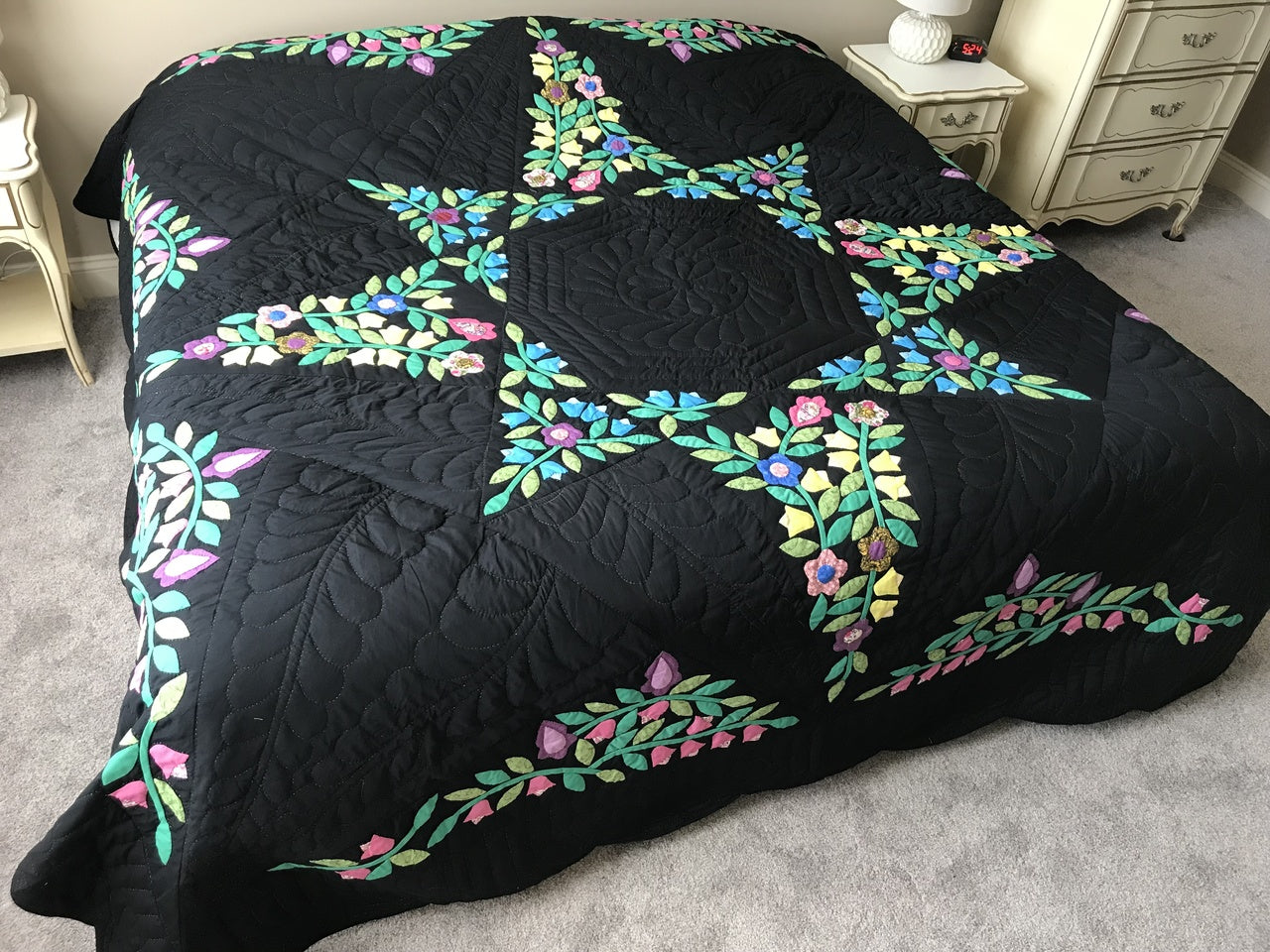 Black Amish Quilt with a Stunning Flower Star Pattern