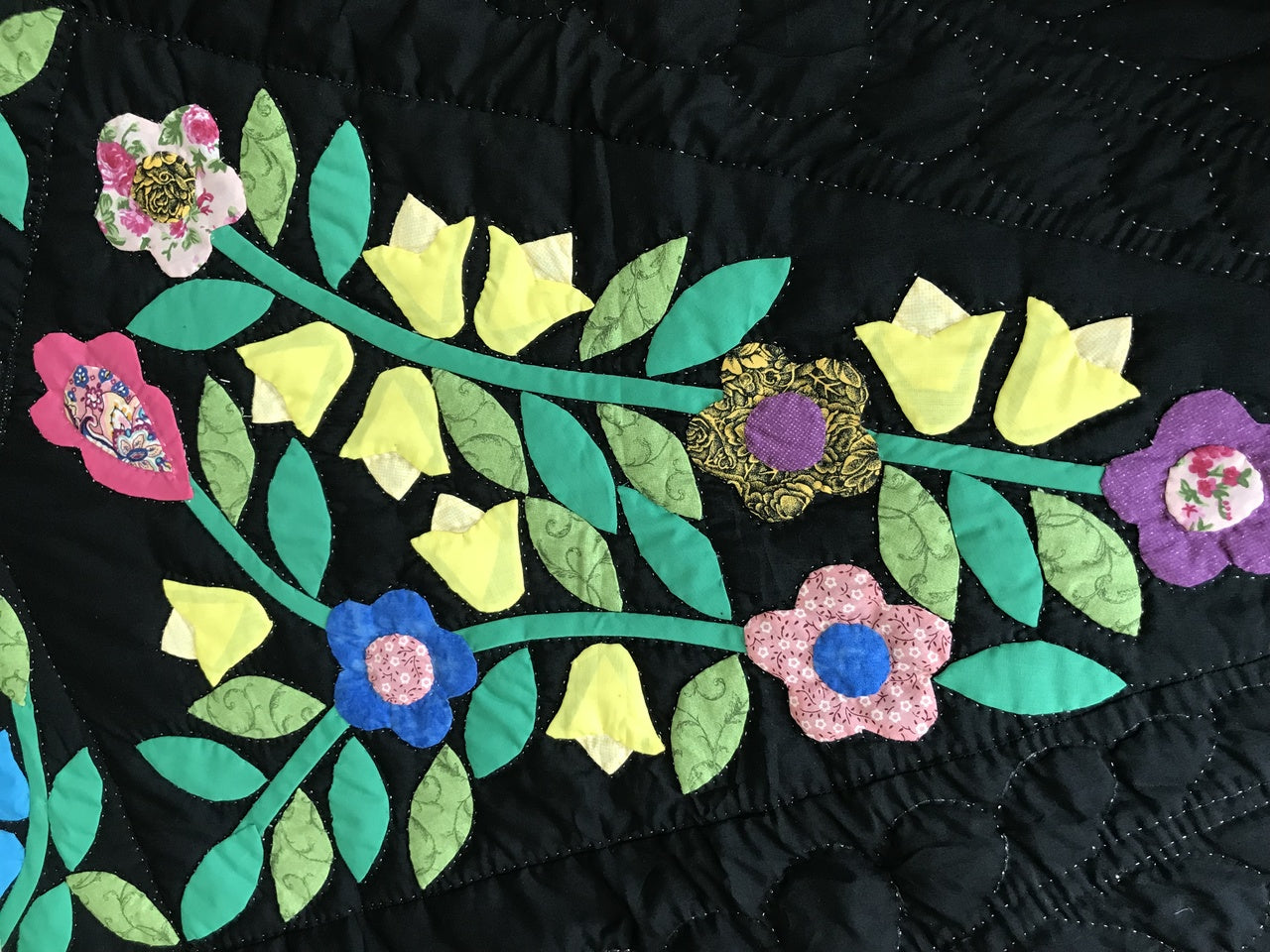 Black Amish Quilt with a Stunning Flower Star Pattern