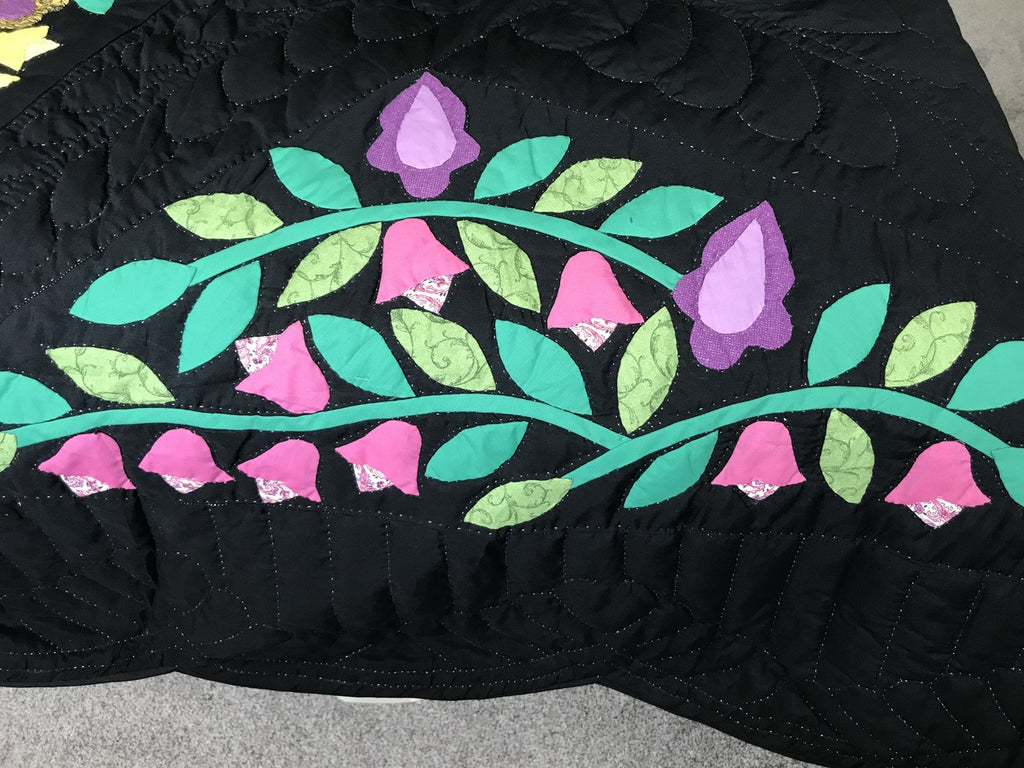 Black Amish Quilt with a Stunning Flower Star Pattern