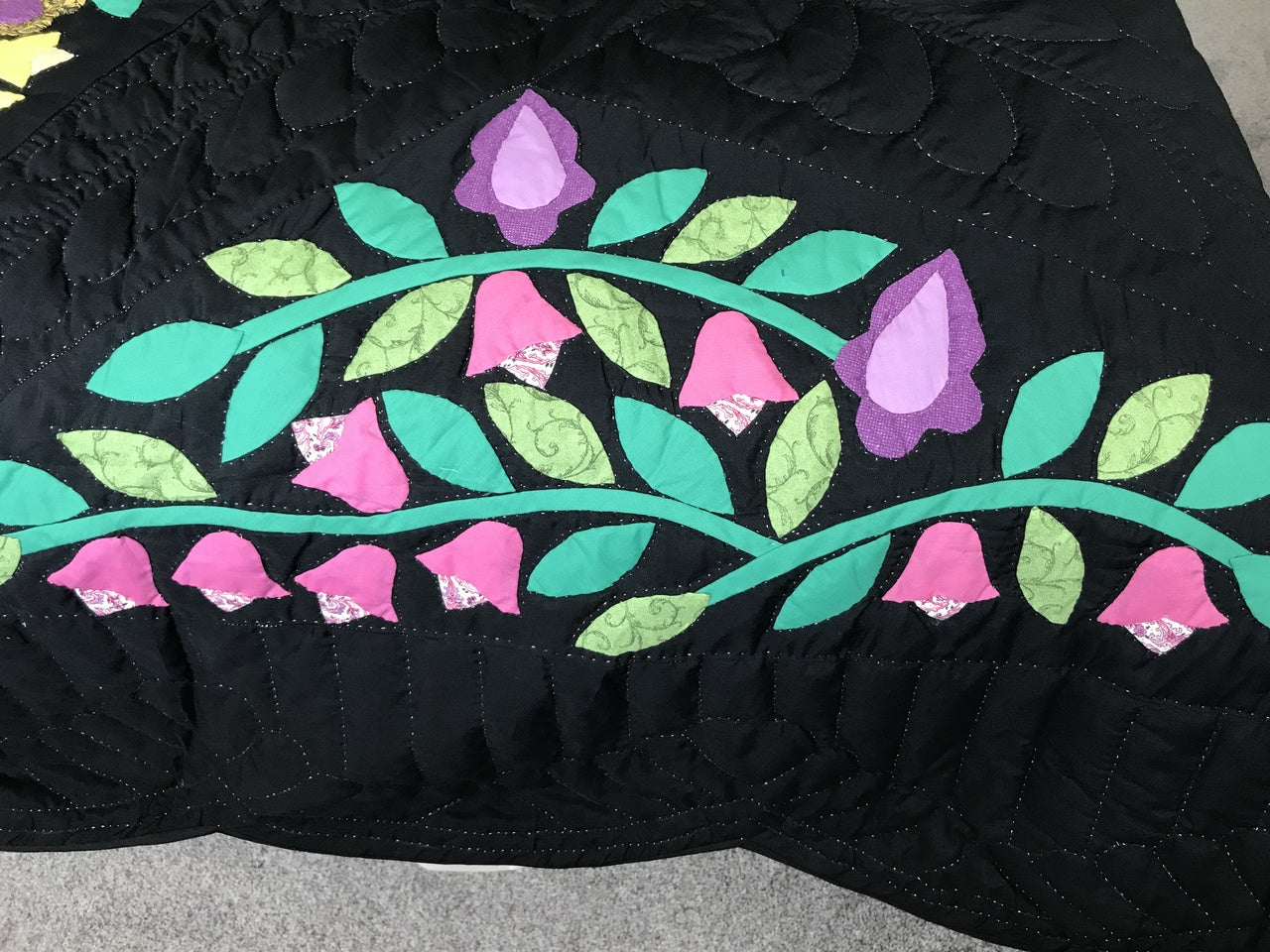 Black Amish Quilt with a Stunning Flower Star Pattern