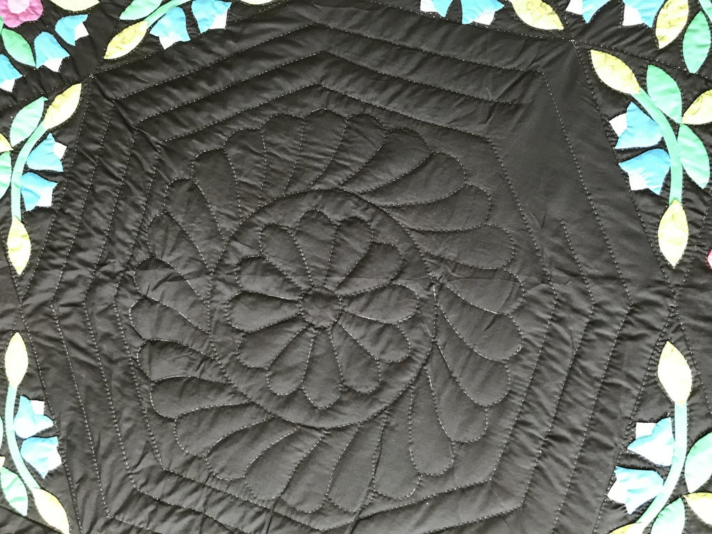 Black Amish Quilt with a Stunning Flower Star Pattern