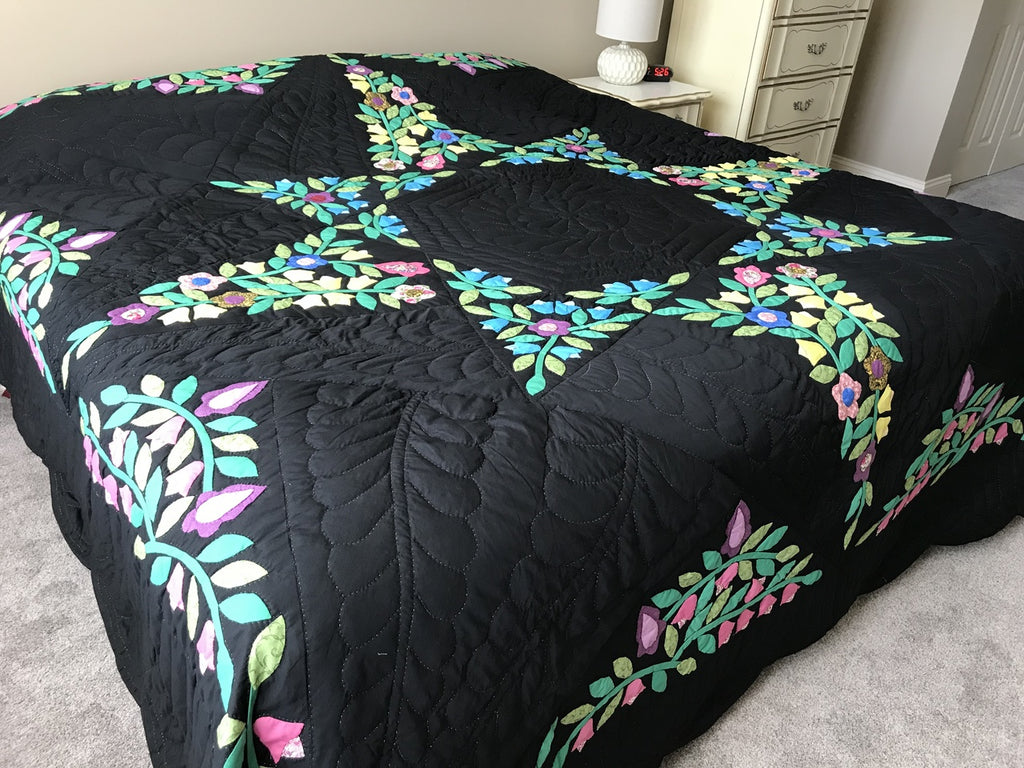 Black Amish Quilt with a Stunning Flower Star Pattern