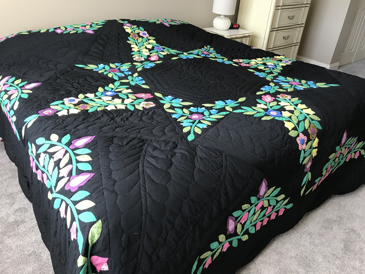 Black Amish Quilt with a Stunning Flower Star Pattern