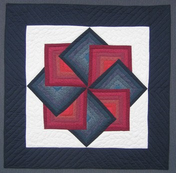 Amish Spinning Star Wall Hanging Quilt